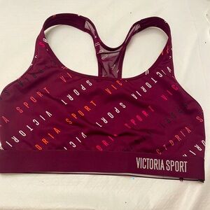 Victoria Sport dark Grape with flashes of  its name over it.  Size Large